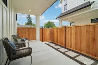 Covered patio with fully fenced side-yard and irrigation