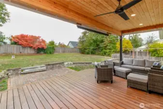 .44 ACRE Lot that has a shed, deck, hot tub , covered deck which has overhead lighting and a fan.