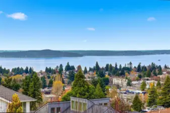 Zooming in view of the water and mountain views from living room.