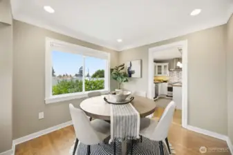 Nice sized dining room also enjoys some views from large north facing window.