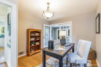 The main level bedroom has often been used as a home office.   (photo from 2021)