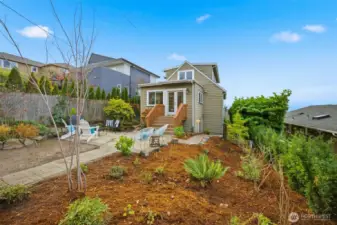 A structural retaining wall along back north property line was just completed and fresh landscaping completed that includes NW native plants and trees.  Established lawn should grow back in spring.