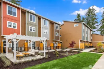 Three stories with spacious entry and lower level attached garage complete with EV Charging Station.