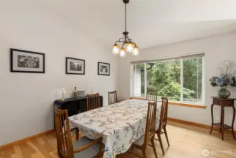 Gleaming hickory flooring is complemented by tile and plush carpeting.