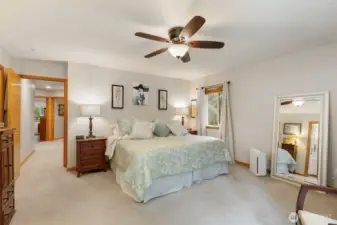 Primary suite is it's own retreat, with walk in closet, and private bath wtih double vanity, walk in shower, and toasty heated floors.