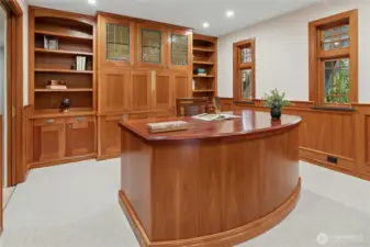 The built-in cabinets will hold all your necessities, and the desk stays here for you. An outlet below the desk is available.