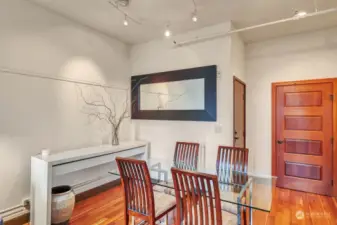 The dining room seamlessly connects to the kitchen and living room, creating an ideal space for gatherings.