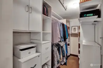 Walk-in closet with built-ins for your storage needs.