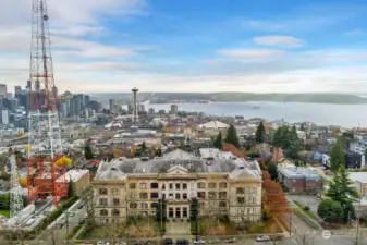 Aerial. Nestled in the heart of Queen Anne Hill, you're just steps from vibrant dining, boutique shopping, and lush parks.