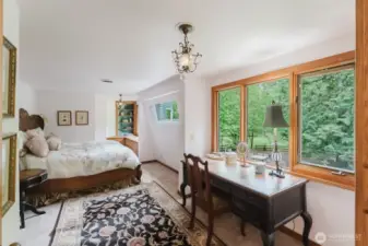The primary bedroom is designed to take in the beauty and calm of the landscape.