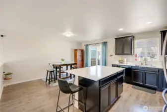 Kitchen with quartz countertops and stainless steel appliances