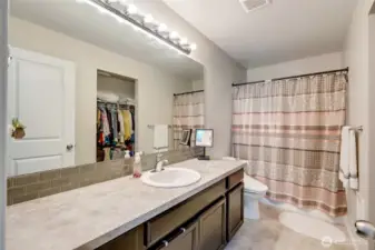Primary bath with walk-in closet