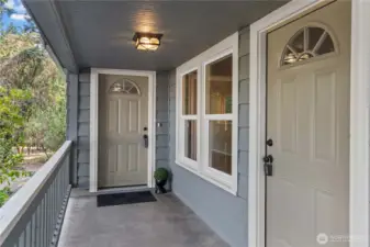 Two Covered Entrances: One into Living Room and One into WFH Space.