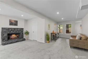 As we go further into the Family Room, you'll notice the 2nd Fireplace (door leads to 3rd bedroom)