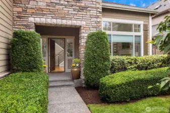 Lovely stone work accents the front entry