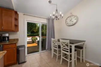 Dining area with slider to back deck