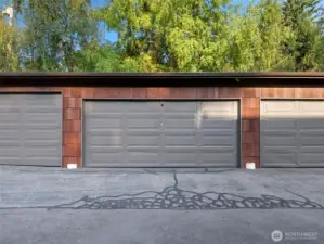 Enclosed garage shared with one other unit.
