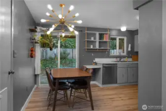 New lighting fixture in the Dining area, slider to the back patio.