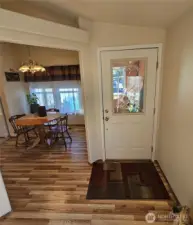 Enter into the home and enjoy the beautiful hardwood flooring throughout the home.