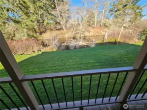 Enjoy the riverside view from the deck and the dining room.