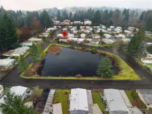 It sits on this peaceful pond - lots of bird activity to watch!