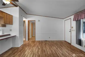 LR - showing access to the spare 2 BRs and front door.