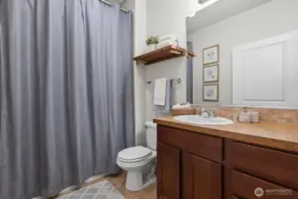 Full ensuite bath to junior primary on main level.