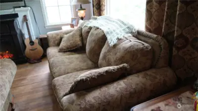 front room with hardwood floors