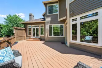 This enormous deck spans from the formal living room to the family room providing outdoor connections all around the interior living spaces.