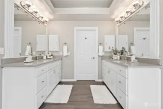 Beautiful updates throughout the primary bath including quartz countertops and stunning tile floors!
