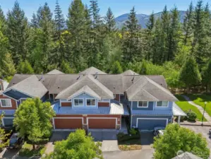 Extra Special location with forest, guest parking to right of building and pathway to trail.