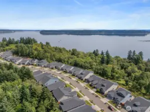 A Well Maintained Community with Manicured Lamp Lit Streets, Planned Walking Trails, & Nearby Beach Access!