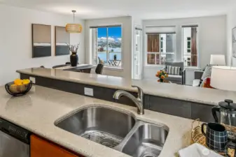Spacious kitchen is open to the living space- check out the views of the lake!
