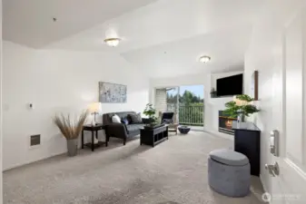 Sliding glass door out  to private balcony with storage closet.