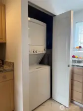 Stackable washer and dryer - hot water heater.