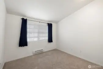 Guest room with vaulted ceilings.