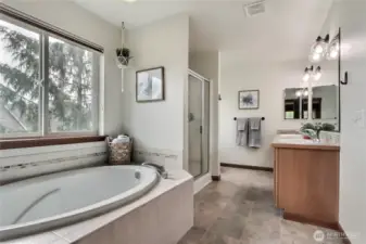 Primary ensuite bath, so relaxing! True 5-piece with soaking tub and separate shower.