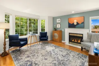 Large welcoming living room, with electric fireplace.