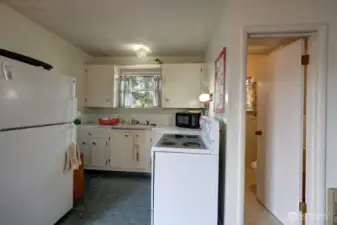 Kitchen with the doorway to the bathroom