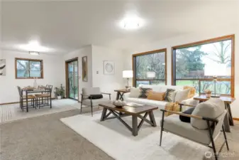 Adjacent to the living room is the dining room.