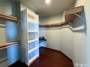 Lots of storage space in primary walk in closet