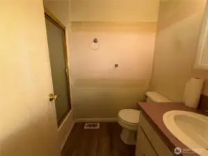 3/4 bathroom off primary.