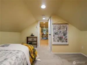 The top level bedroom has a large closet and the attic space is easy access and can be used for storage.