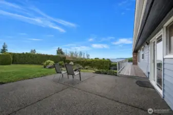 Main level patio with Views of the Puget Sound and Amazing Sunsets