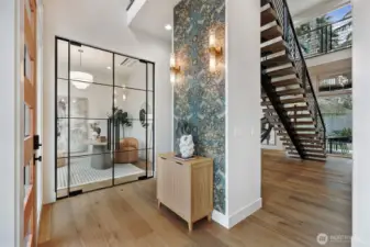 Main floor office with beautiful gridded glass french doors