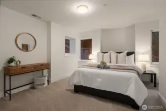 Generous lower-level bedroom with a neutral soothing palate.