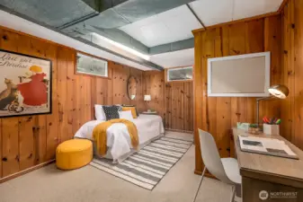 The lower level offers a third bedroom with an attached bath... Great guest quarters or office space.