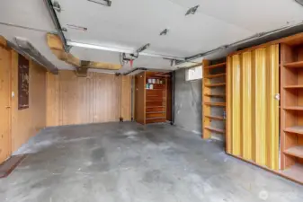 The garage is unusually large for this era home.  The owners drove a Subaru and were able to park it in here and open the doors!  In addition it has plenty of storage + a secret room!