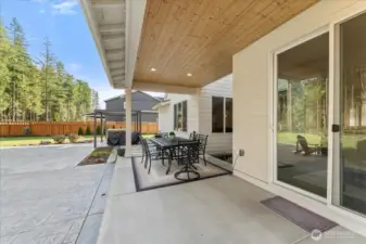Designed for hosting, the extended patio provides a variety of outdoor entertaining zones.