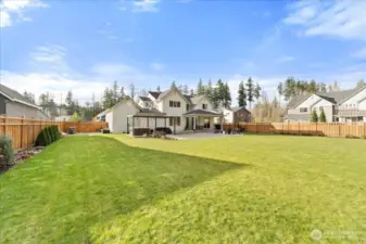 An unbelievable level 17,000 sq ft lot provides a rare opportunity for space privacy, and outdoor enjoyment.  Fully fenced and enhanced with a sprinkler system, this lush property backs to a serene greenbelt creating a private,park-like setting for family living, entertaining, and landscaping dreams.